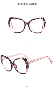 Detailed views of purple flower tortoiseshell frames with clear pink temples
