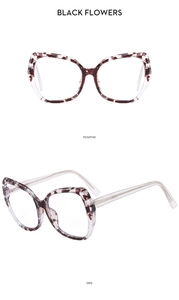 Macro detail of TR90 anti-blue light glasses with black floral frames and cat-eye design