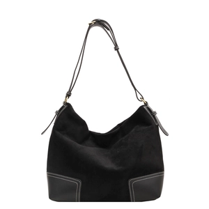 Large black suede tote bag with leather corner patches and contrast stitching details