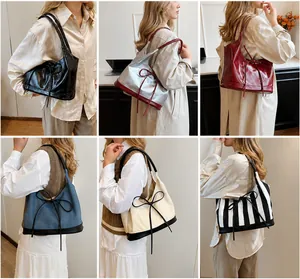 Multiple color options of PU tote bags with bow details shown on model's shoulder