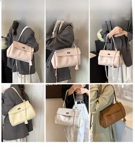 Detailed close-up of flip-top leather shoulder bags in four soft minimalist colors