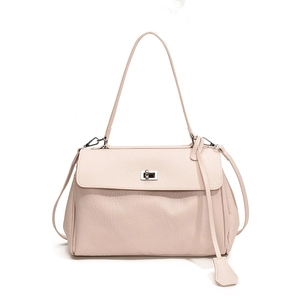 Pale pink lychee grain leather underarm shoulder bag with metal twist lock closure