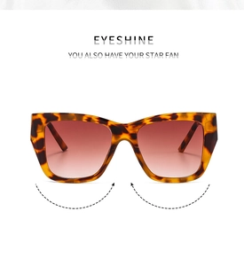 Detail of square oversized tortoiseshell sunglasses with brown gradient lenses