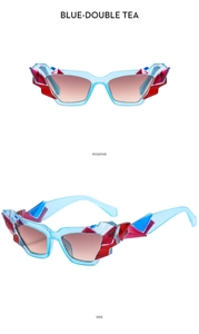 Dettaglio occhiali da sole cat eye con montatura blu e lenti sfumate color tè