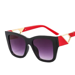 Square fashion sunglasses with black frames and red-gold cutout temples for women