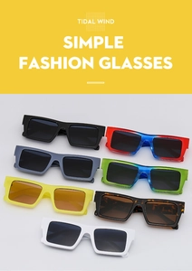 Detail display of rectangular fashion sunglasses in multiple colors and sleek frame finishes