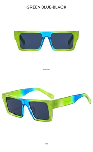 Detail of square two-tone sunglasses with green-blue gradient frame and dark grey lenses