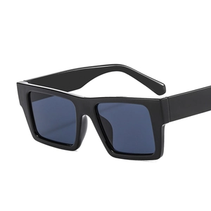 Classic black square sunglasses with wide frames and dark lenses for a retro chic look