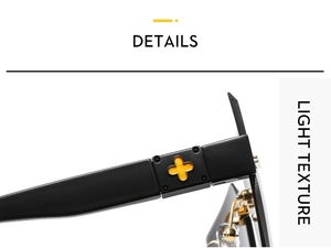 Close-up of black matte sunglasses arms with yellow star detail and gold hinges