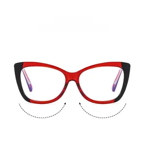 Detailed front view of cat-eye frames featuring bold black and transparent red two-tone design