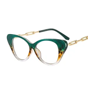 Cat eye blue light blocking glasses with green gradient frames and gold chain temples