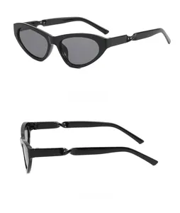 Detail view of cat eye sunglasses showing twisted wavy temple design and side profile