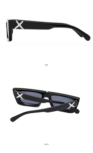 Detail view of small square sunglasses showing silver X logo on the black temples