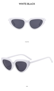 Front and side view of white Y2K cat-eye sunglasses with dark black lenses and thick frames