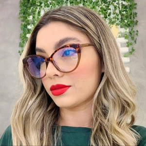 Detailed side view of cat-eye TR90 frames with dark tortoise texture and blue light lens