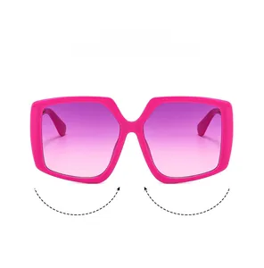 Detailed front view of hot pink butterfly oversized frames with purple gradient lenses