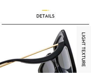 Detail of oversized sunglasses featuring hollow gold metal temples and light texture frame