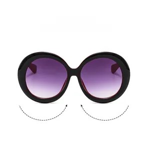 Detail view of round black frames and purple gradient lenses for chic sunglasses