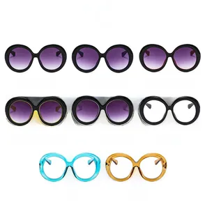 Collage of round oversized sunglasses in eight different gradient color lens variations