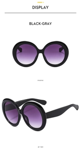 Front and 45-degree side views of black round sunglasses with purple gradient lenses