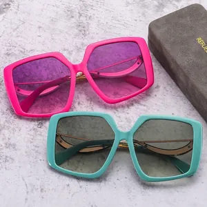 Oversized butterfly square sunglasses with hollow metal temples in pink and teal