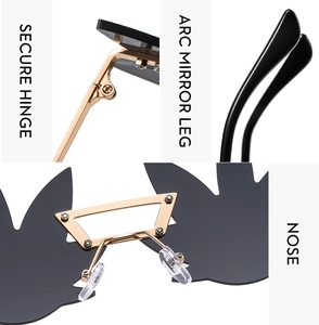 Detail of rimless maple leaf sunglasses featuring secure hinges and arc mirror legs
