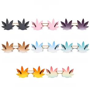 Collection of rimless maple leaf sunglasses in eight vibrant gradient colors with gold metal frames