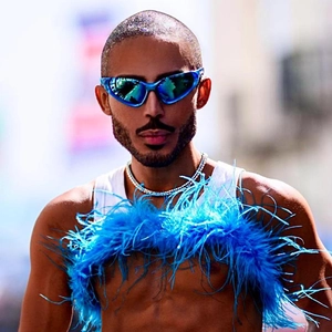 Futuristic blue Y2K sports sunglasses with mirrored cat-eye lenses for a trendy look