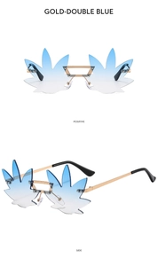 Close-up of rimless maple leaf sunglasses with gold metal frame and blue gradient lenses