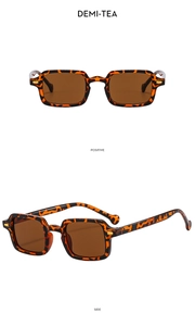 Detail view of demi-tea square sunglasses showing positive and side frame angles