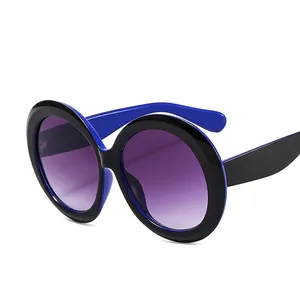 Classic round frame sunglasses with black and blue contrast and purple gradient lenses
