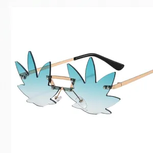 Fashionable rimless maple leaf sunglasses with gold frames and blue gradient lenses