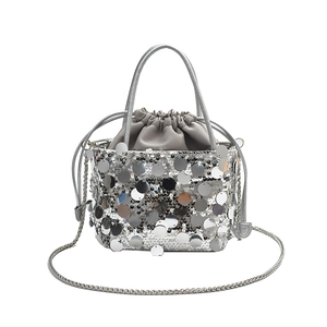 Silver sequin bucket bag for women with chain strap and drawstring inner pouch