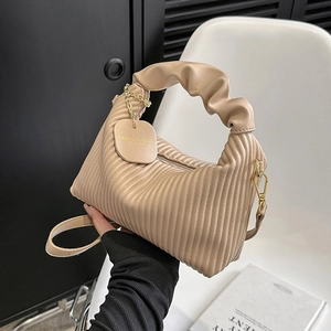 Fashionable beige pleated dumpling handbag with detachable strap and gold metal hardware