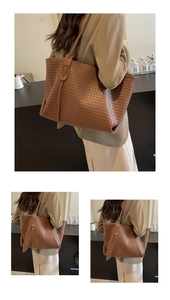 Macro shot of brown woven tote bag detailing leather texture and premium craftsmanship