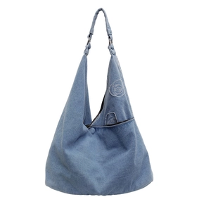Light blue denim tote bag with embroidered rose detail and single shoulder strap