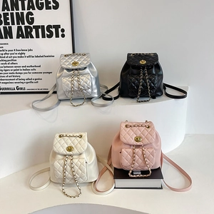 Chic quilted rhomboid backpack with chain straps in black, beige, pink, and silver