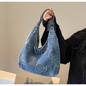 Blue denim shoulder bag with white rose embroidery and vintage metal chain strap