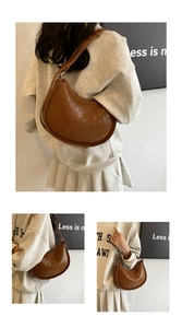 Detail of dark brown quilted crescent bag featuring polished faux leather and stitching