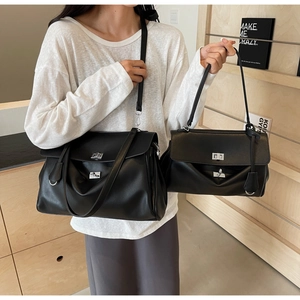 Detailed comparison of large and small black faux leather tote bags with silver clasps