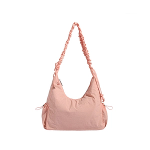 Pink nylon hobo shoulder bag with pleated cloud strap and drawstring side details