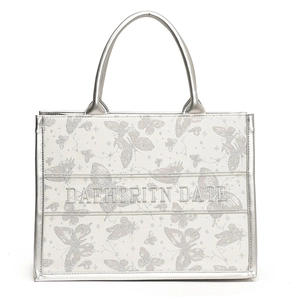 Silver celestial butterfly canvas tote bag with large capacity for stylish commuting