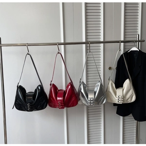 Glossy patent leather crescent bags in black, wine red, silver and cream colors
