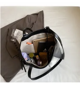 Internal view of large capacity tote bag showing space for tablet, umbrella and makeup