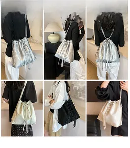 Multiple ways to wear the textured bucket bag including shoulder, crossbody, and backpack