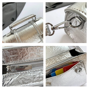 Detail of silver metallic crinkled messenger bag with zipper and colorful card slots