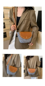 Detail of crossbody saddle bag with houndstooth fabric, brown leather, and gold studs