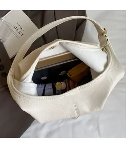 Interior view of off-white tote bag showing large capacity for tablet and cosmetics