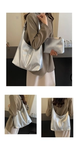 Detail of silver metallic tote set with textured finish and matching pouch bag