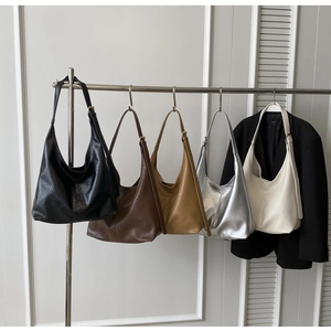 Detailed display of hobo tote bags in five colors with adjustable metal buckle straps